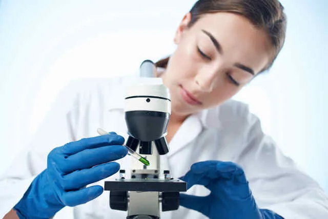 small-vecteezy_woman-laboratory-assistant-microscope-research-biotechnology_22390842_small